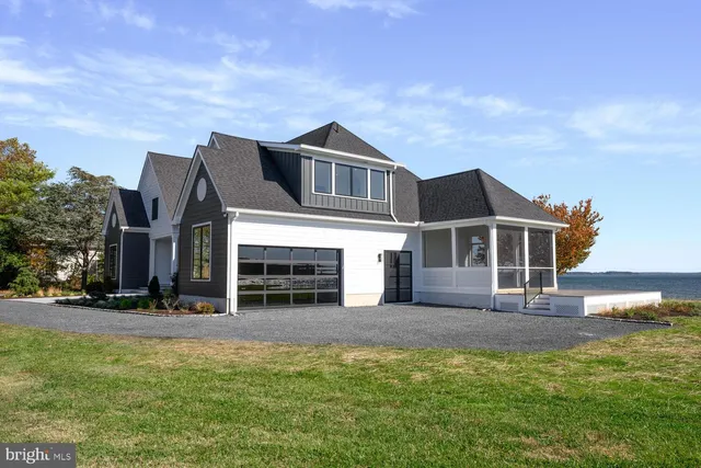 a view of an empty room with a fireplace