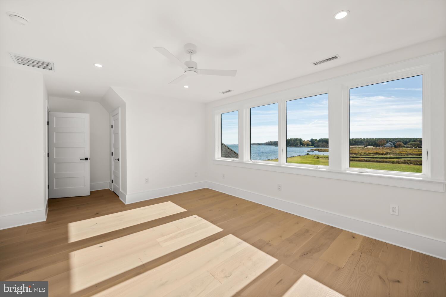 21485 Island Club Road Tilghman, MD 21671 - Photo 46 of 83 a view of an empty room with a window