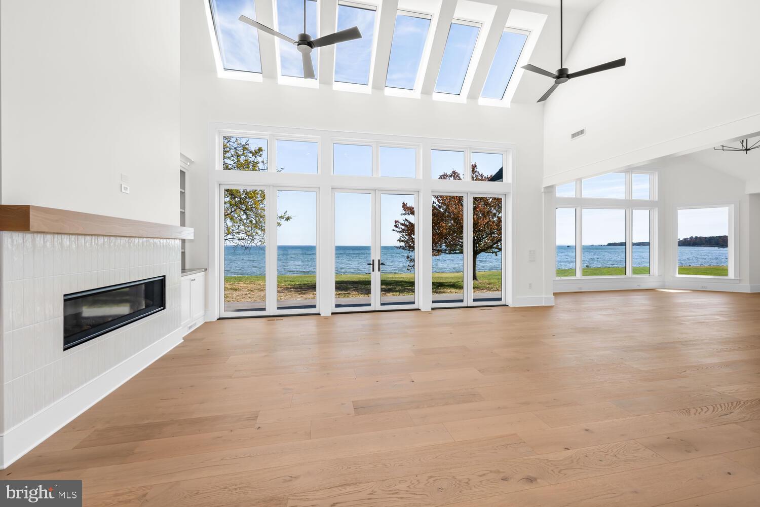 21485 Island Club Road Tilghman, MD 21671 - Photo 5 of 83 a view of an empty room with a fireplace