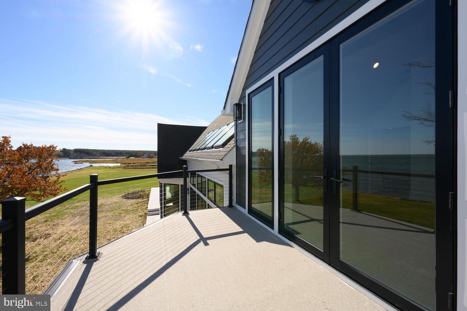 21485 Island Club Road Tilghman, MD 21671 - Photo 57 of 83 a balcony with view of ocean view