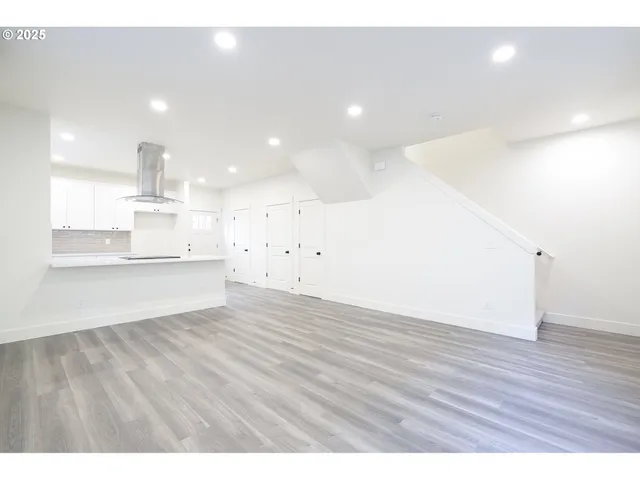 a view of kitchen with wooden floor