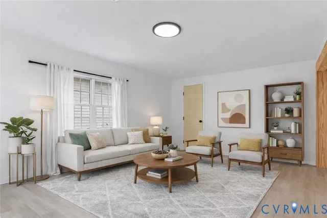 a kitchen with stainless steel appliances a refrigerator a stove a sink and a refrigerator