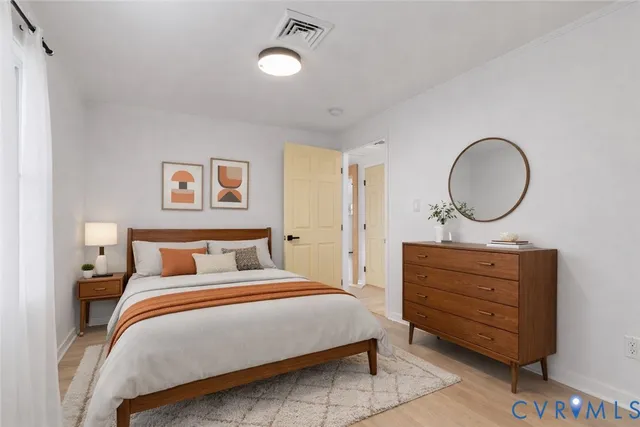 a bathroom with a granite countertop toilet a sink and a shower