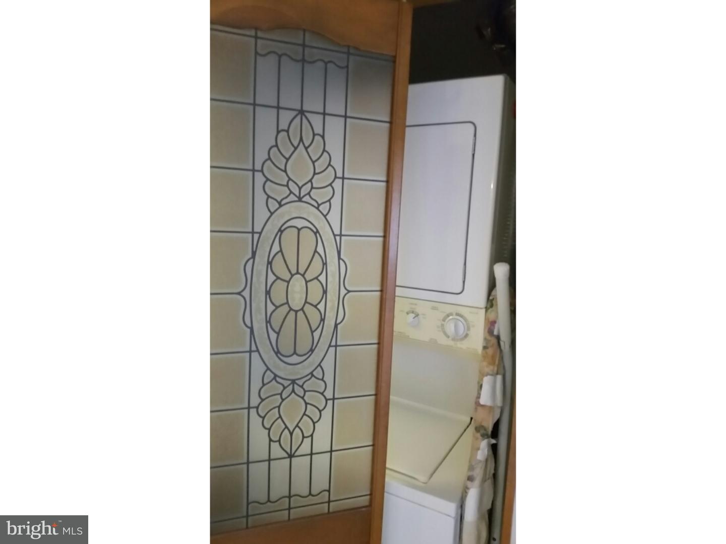 700 Avondale Road, Unit 7E Wallingford, PA 19086 - Photo 19 of 22 Laundry Room