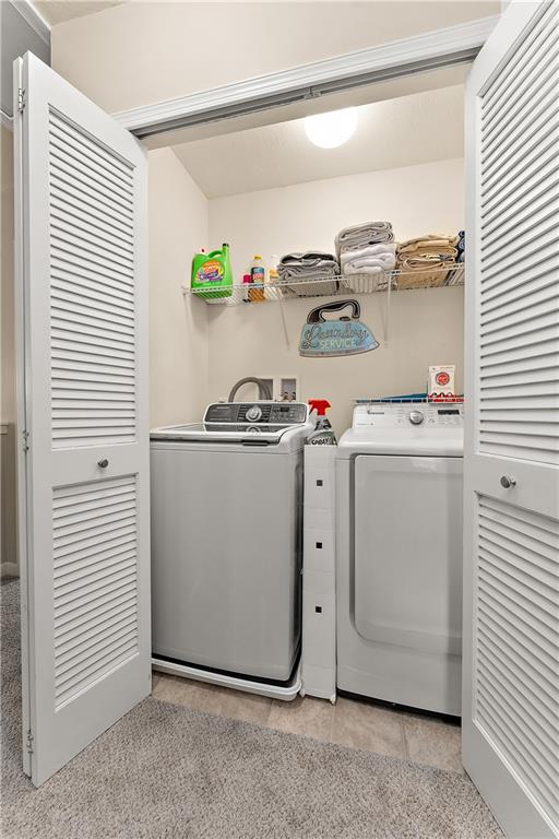 1203 Pointe View Drive Mars, PA 16046 - Photo 29 of 50 a utility room with cabinets dryer and washer