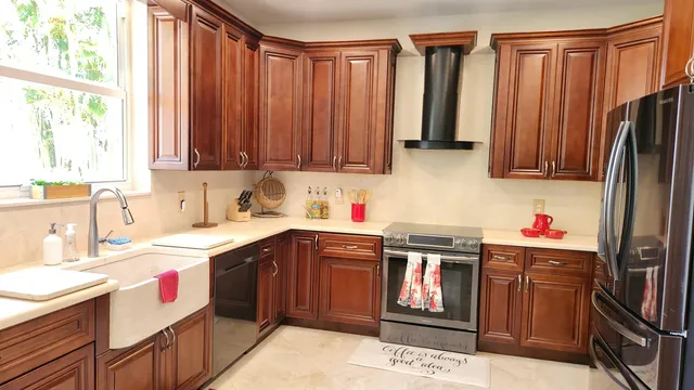 a living room with kitchen island furniture and a wooden floor