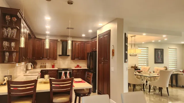 a view of a bedroom with furniture and a window