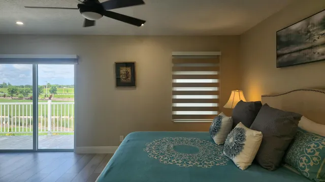 a spacious bathroom with a bathtub and sink