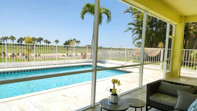 $6,000 | 1851 Corsica Drive, Wellington, FL 33414