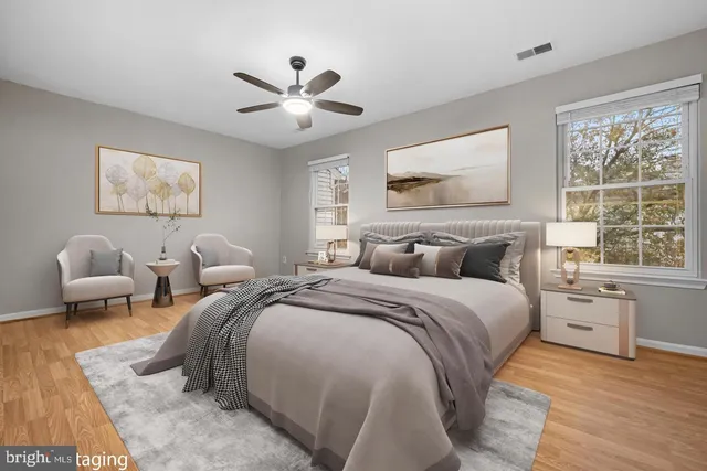 a bed room with bed and a window