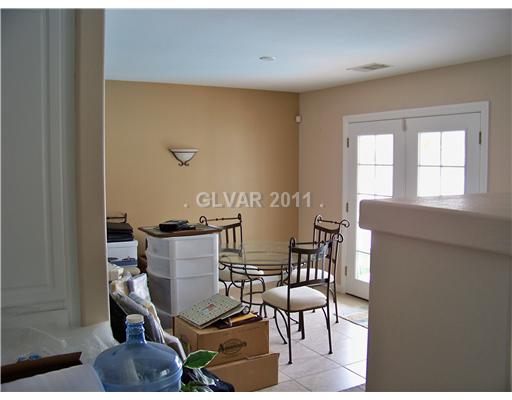 10126 Rice Paper Street Las Vegas, NV 89183 - Photo 8 of 19 Dining Room. Dining room has french doors to patio.