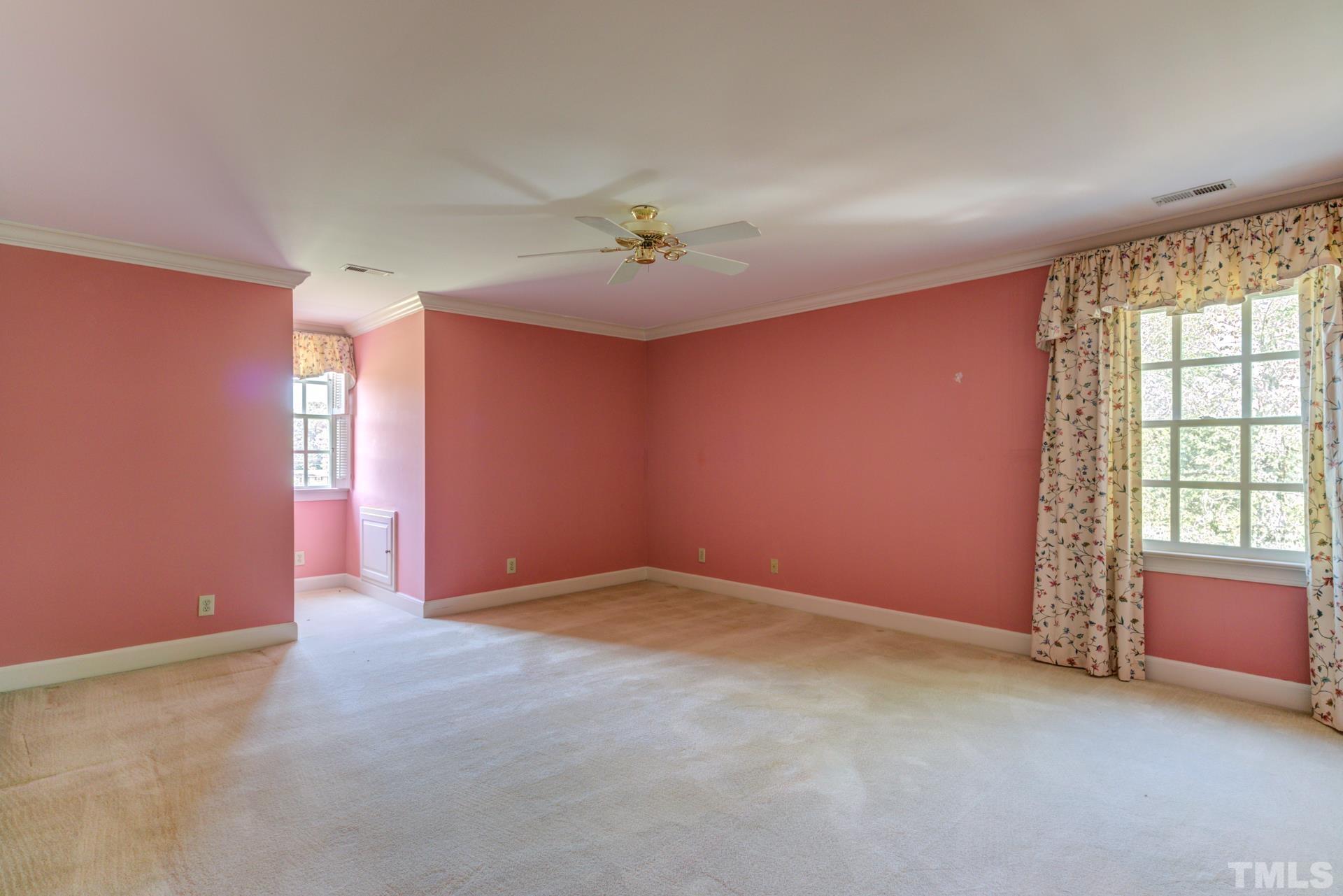1900 Lizard Lick Road Zebulon, NC 27597 - Photo 42 of 84 an empty room with windows and closet