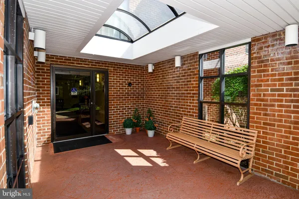 a view of a porch with furniture
