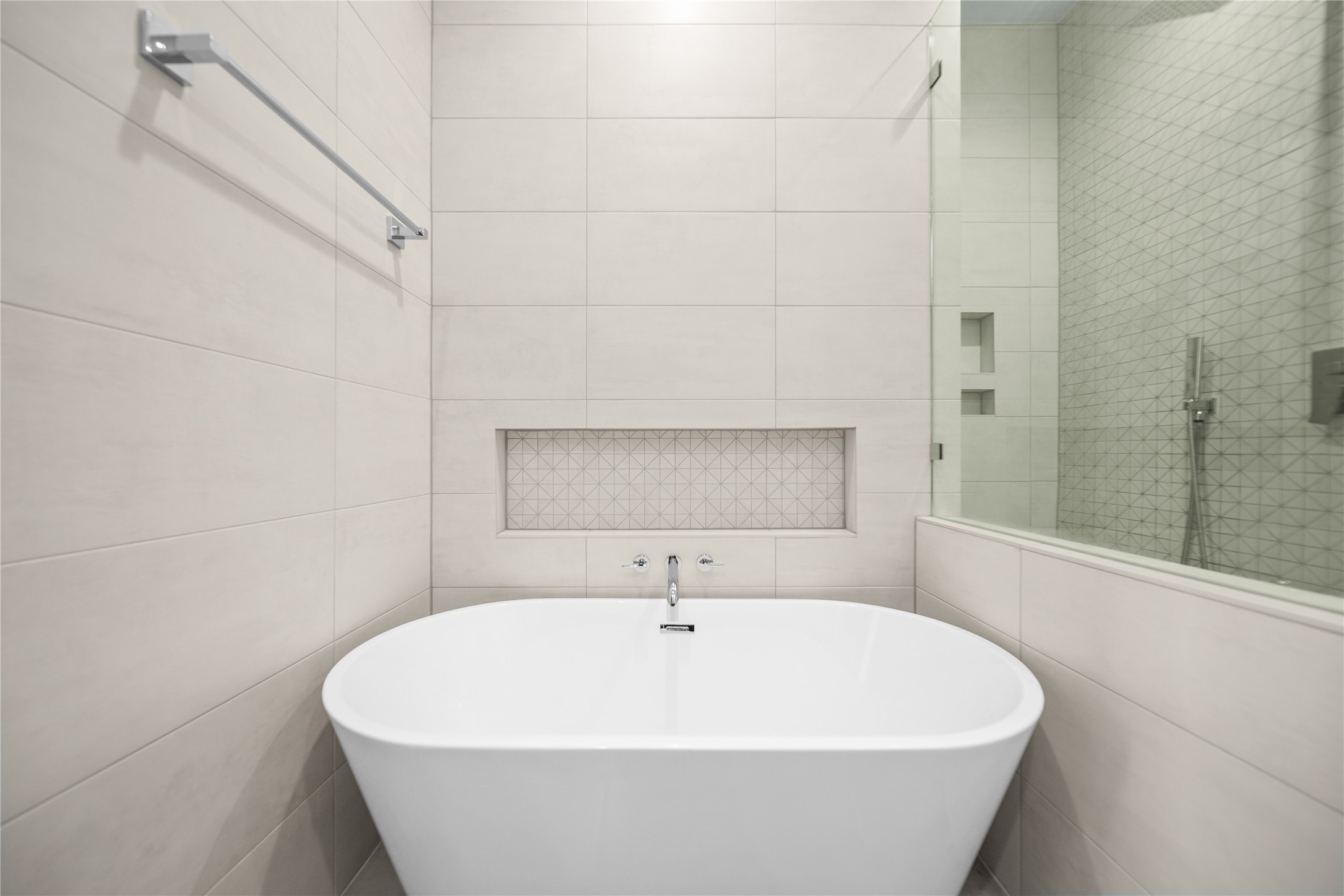 2408 Gray Street Houston, TX 77003 - Photo 14 of 23 a white bath tub sitting in a bathroom