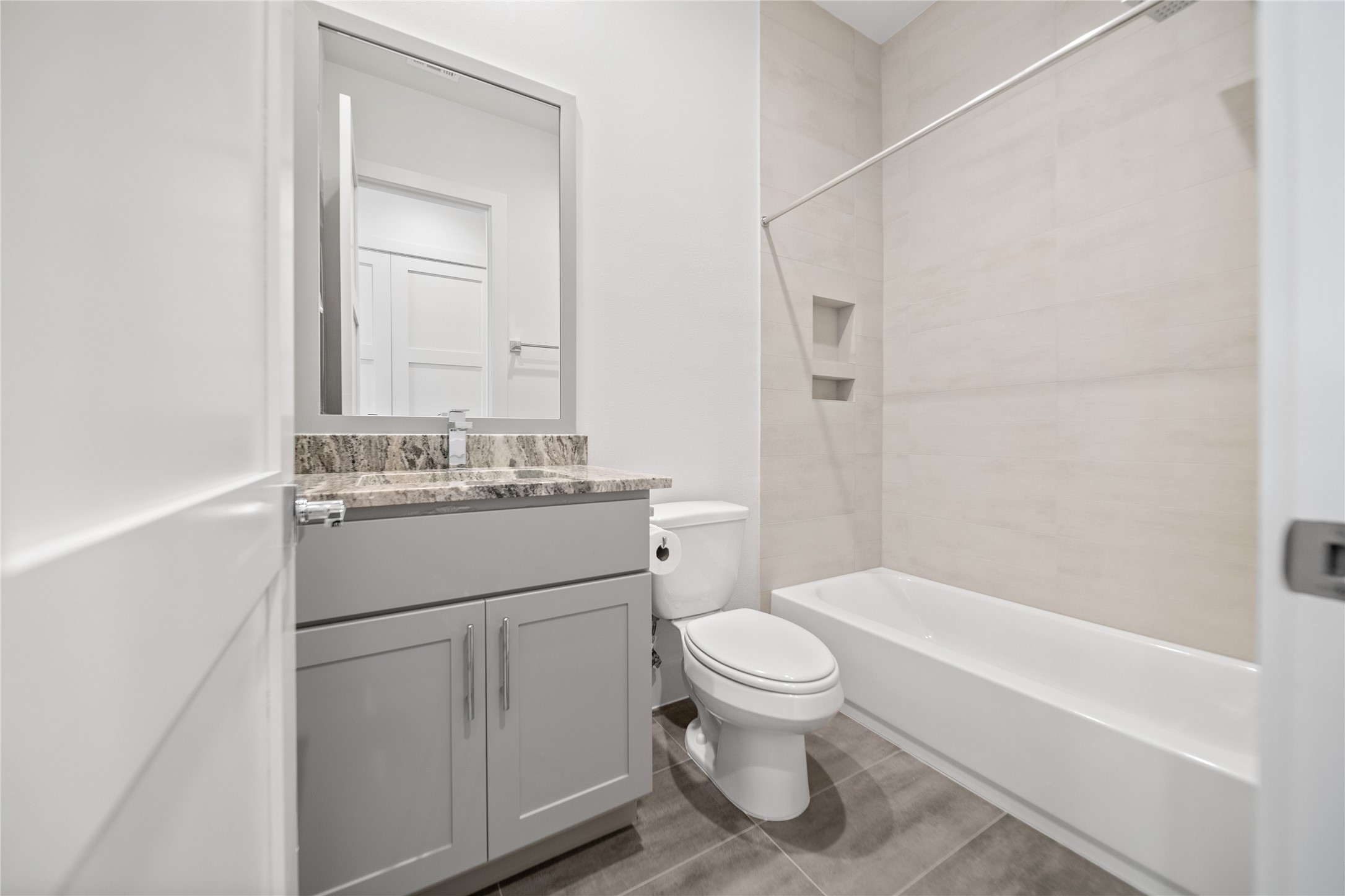 2408 Gray Street Houston, TX 77003 - Photo 19 of 23 a bathroom with a sink toilet and shower
