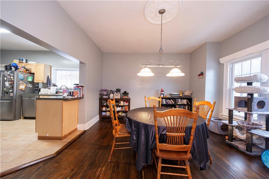 4263 Evergreen Road Pittsburgh, PA 15214 - Photo 8 of 24 a view of a dining room with furniture window and wooden floor