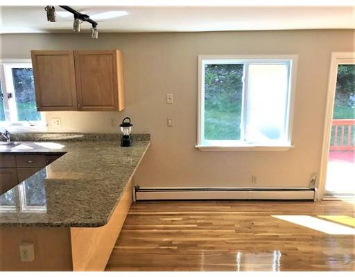 21 Wamsutta Ridge Road Charlton, MA 01507 - Photo 13 of 42 a view of a kitchen with wooden floor and a sink