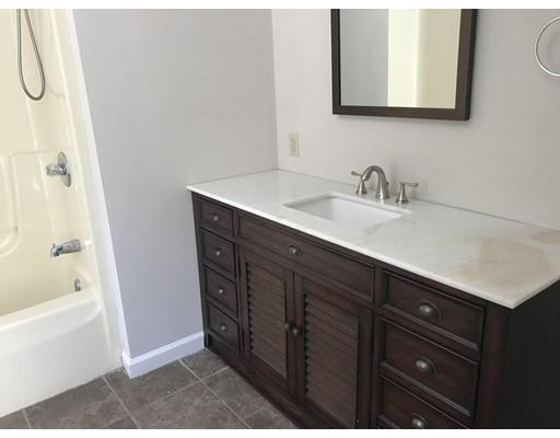 21 Wamsutta Ridge Road Charlton, MA 01507 - Photo 26 of 42 a bathroom with a sink vanity tub and shower