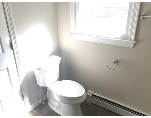 21 Wamsutta Ridge Road Charlton, MA 01507 - Photo 28 of 42 a white toilet sitting next to a window