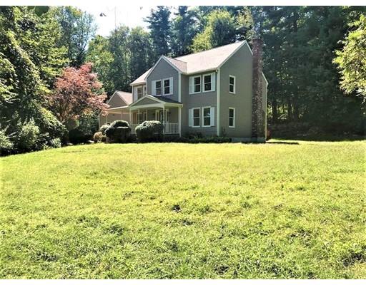 21 Wamsutta Ridge Road Charlton, MA 01507 - Photo 3 of 42 a front view of a house with a yard
