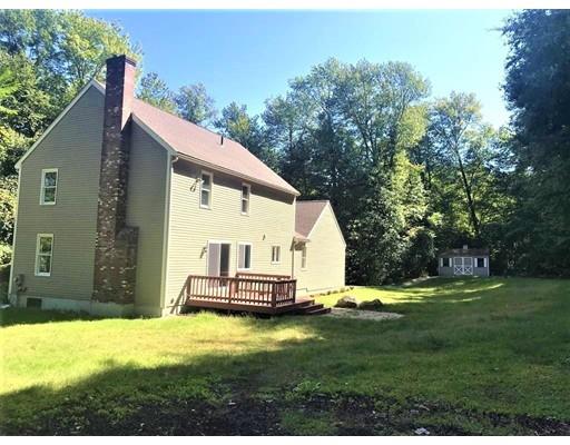 21 Wamsutta Ridge Road Charlton, MA 01507 - Photo 7 of 42 a view of a house with a yard and sitting area