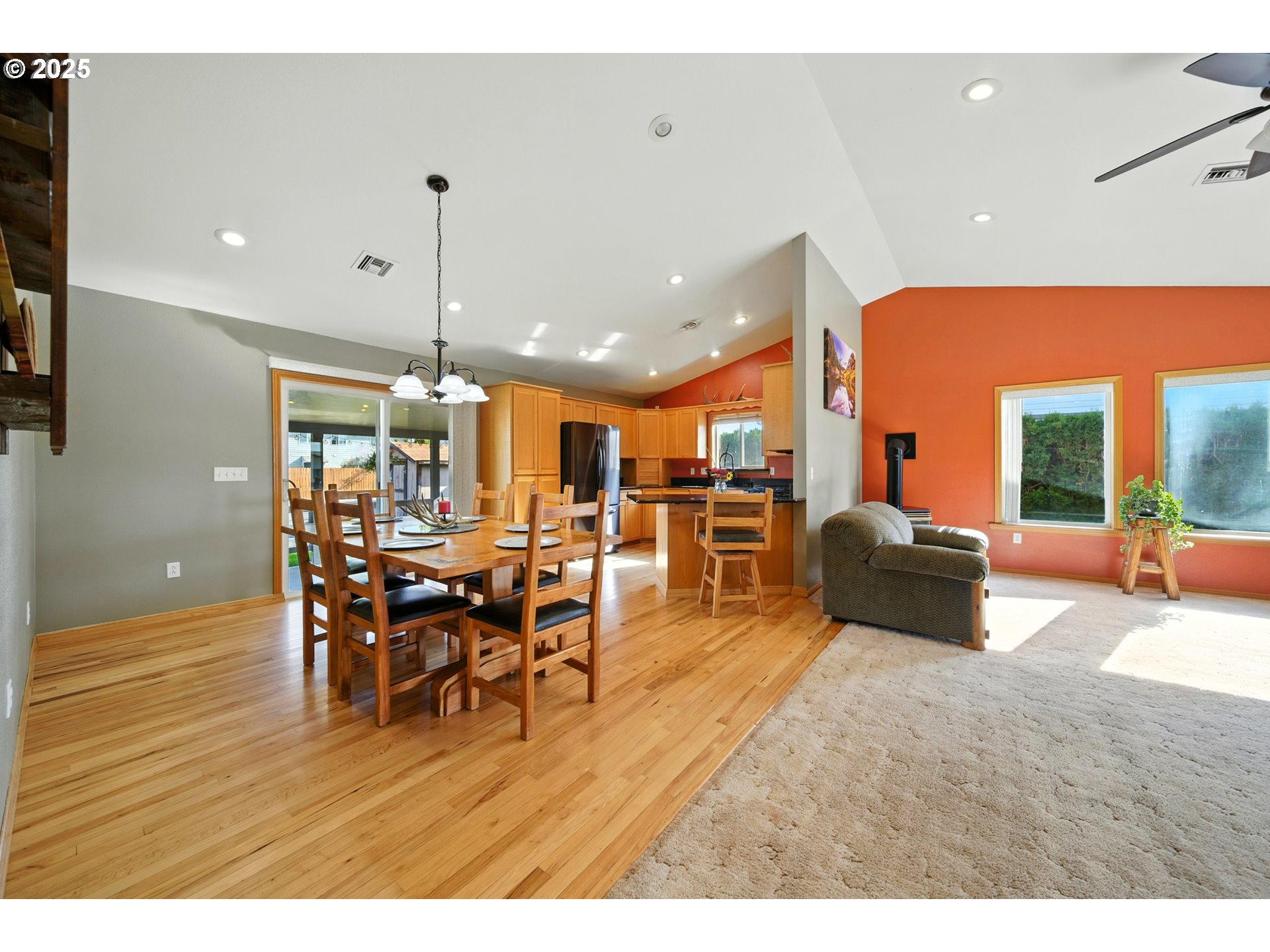 257 West Lincoln Street Athena, OR 97813 - Photo 12 of 37 a living room with furniture a dining table and a large window