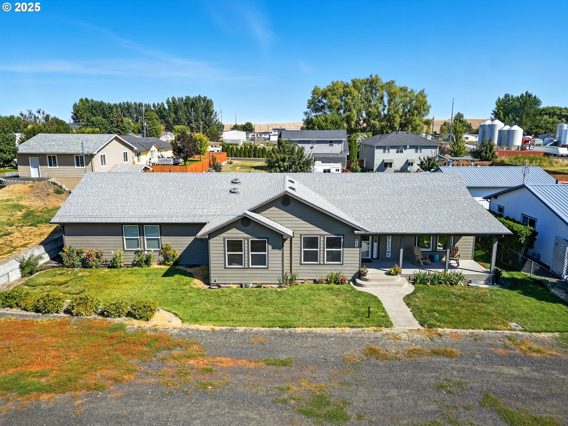 257 West Lincoln Street Athena, OR 97813 - Photo 28 of 37 an aerial view of a house with a yard