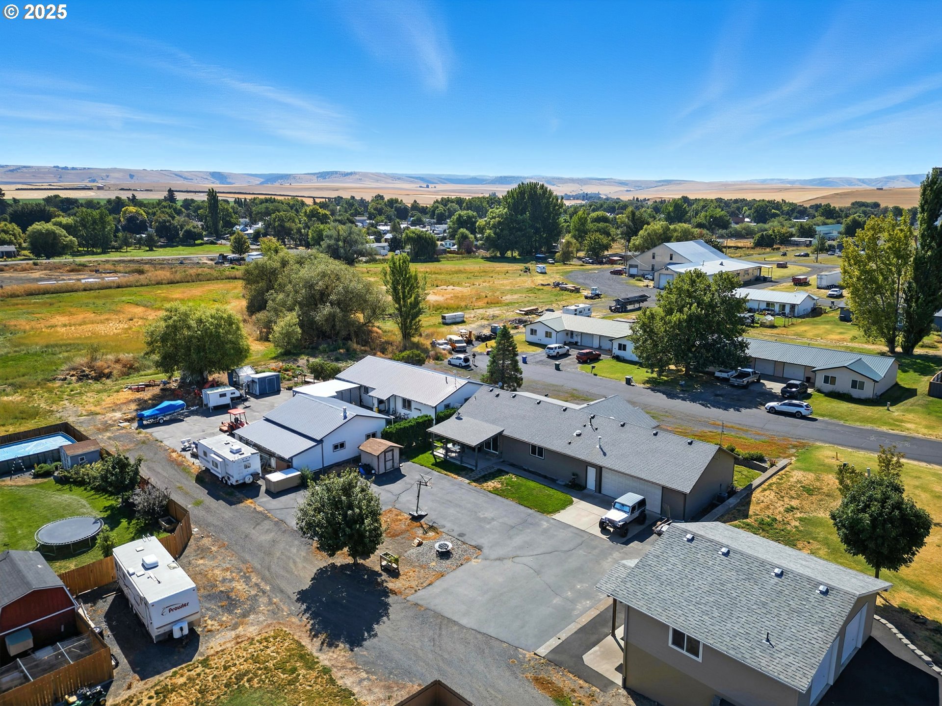 257 West Lincoln Street Athena, OR 97813 - Photo 34 of 37 an aerial view of a house with a lake view