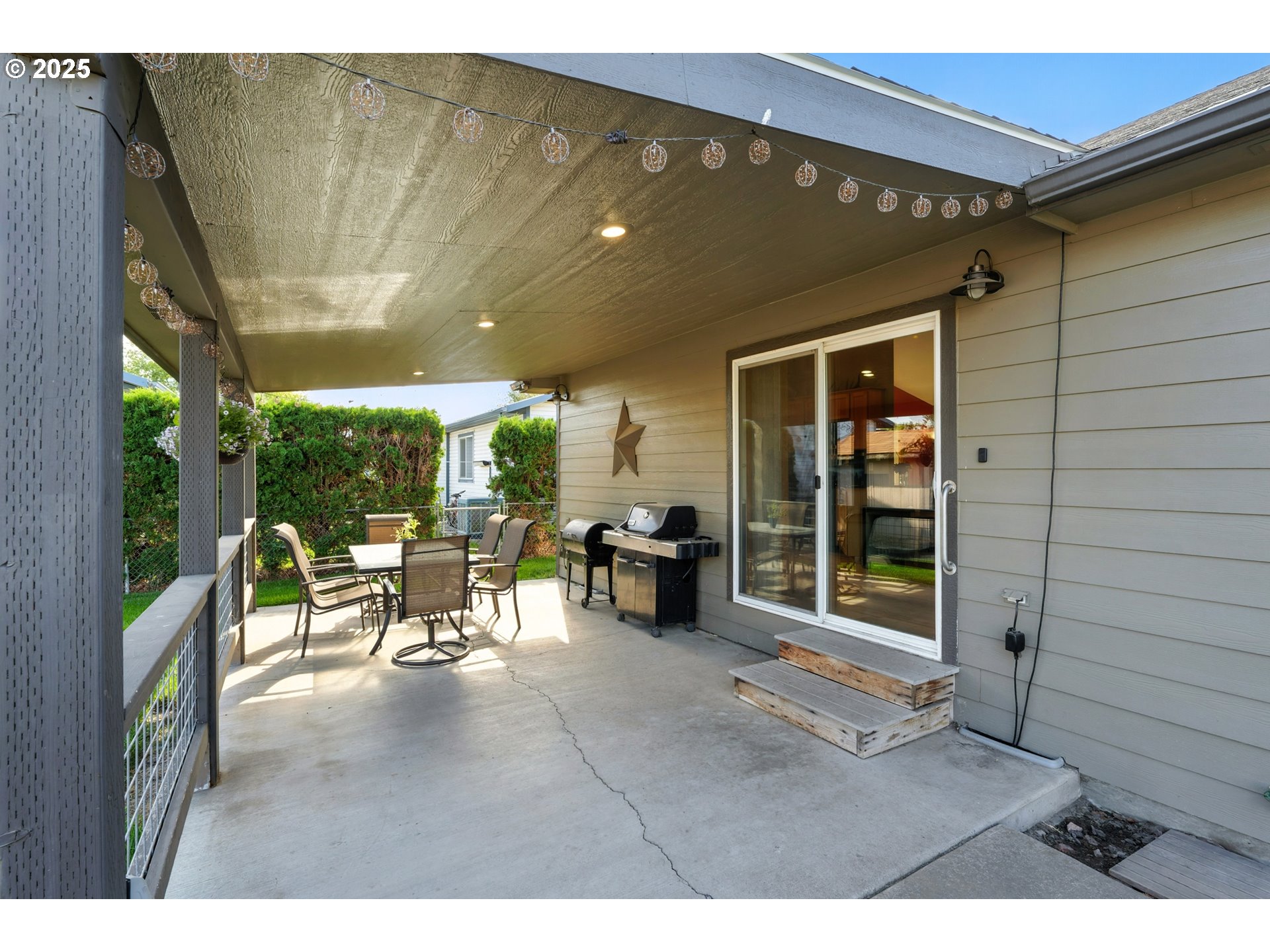 257 West Lincoln Street Athena, OR 97813 - Photo 6 of 37 a view of a porch with chairs and backyard