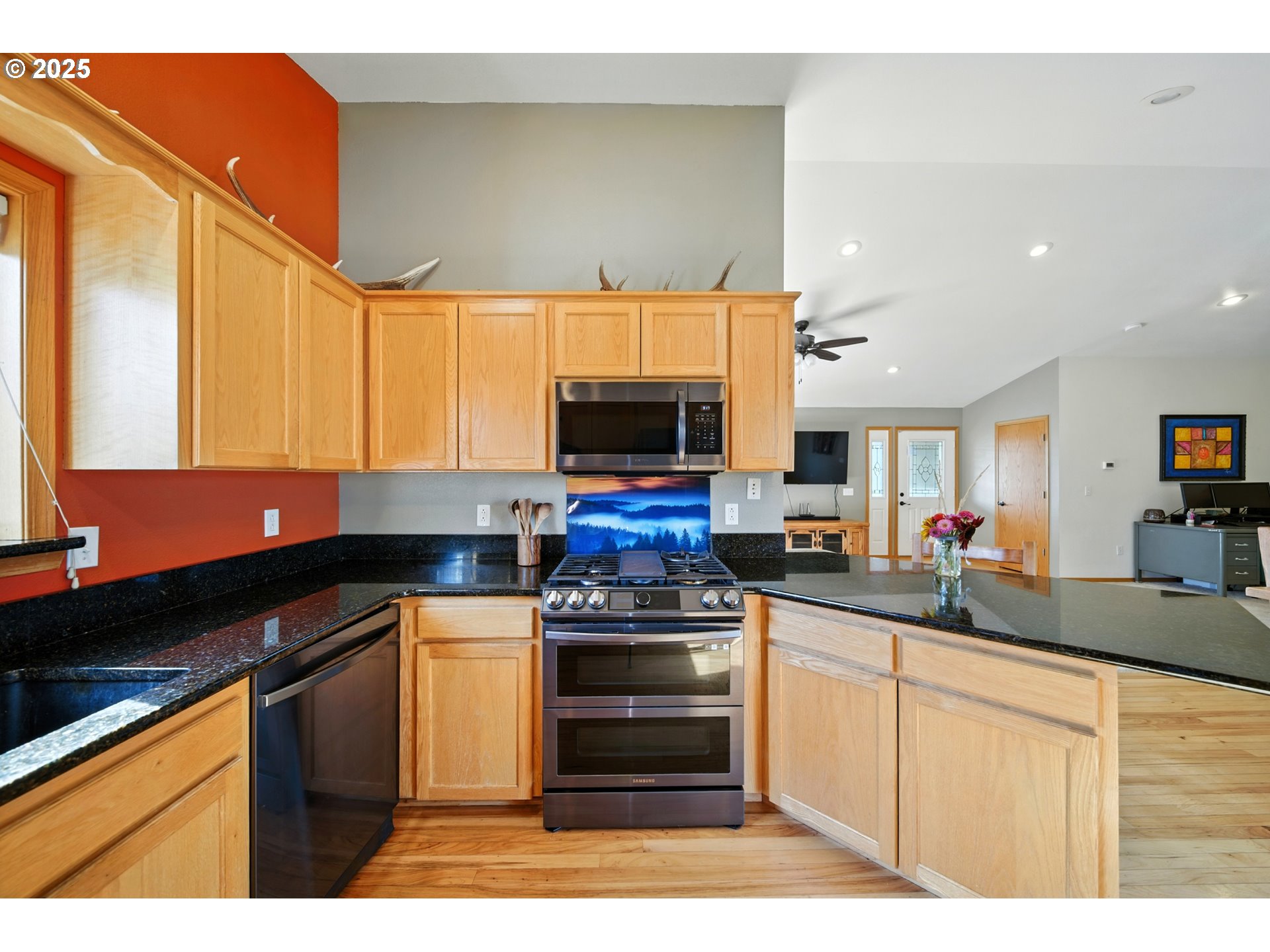 257 West Lincoln Street Athena, OR 97813 - Photo 10 of 37 a kitchen with a stove and a microwave