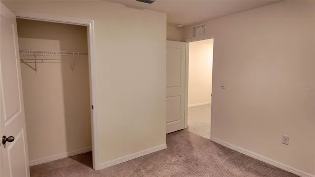 a house view with a backyard space