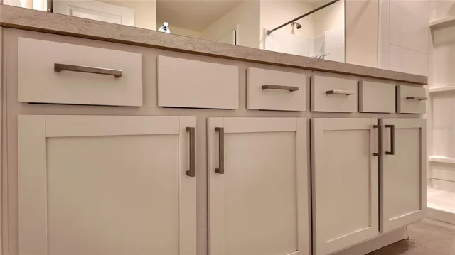 a view of a house with a yard and garage