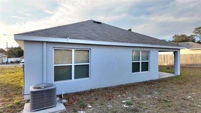 a picture of a table and chairs in the patio