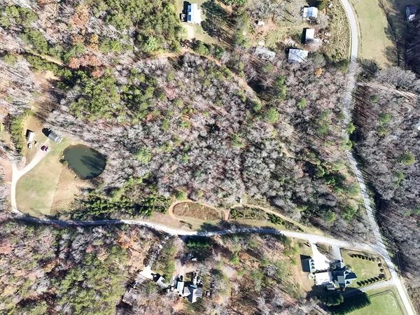 a toilet is sitting in a backyard