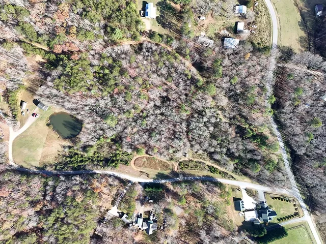 a toilet is sitting in a backyard