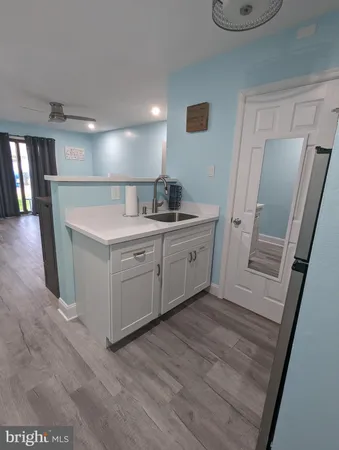 a swimming pool with outdoor seating and yard