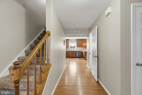 a view of a lake with houses in the back