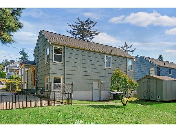5326 South Hazel Street Seattle, WA 98178 - Photo 11 of 13 a view of a house with a backyard
