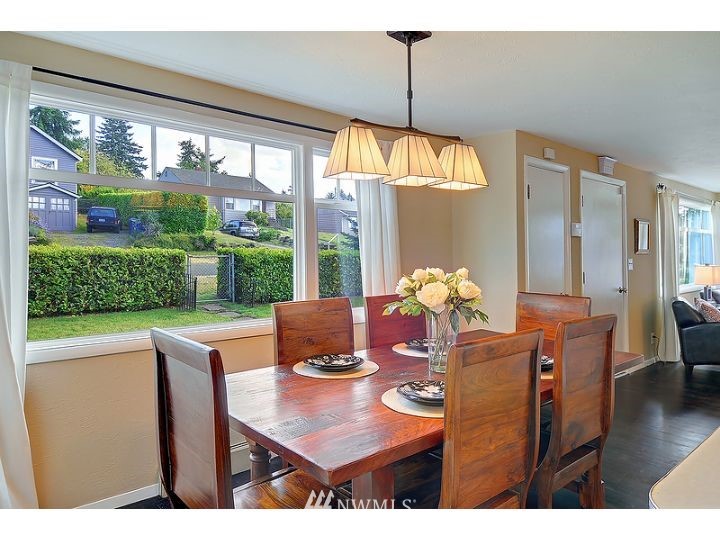 5326 South Hazel Street Seattle, WA 98178 - Photo 3 of 13 a view of a dining room with furniture window and outside view