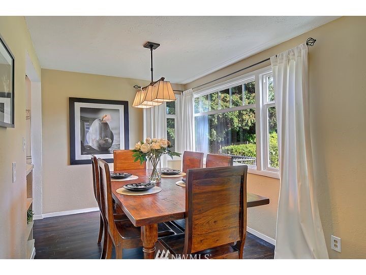5326 South Hazel Street Seattle, WA 98178 - Photo 4 of 13 a view of a dining room with furniture window and outside view