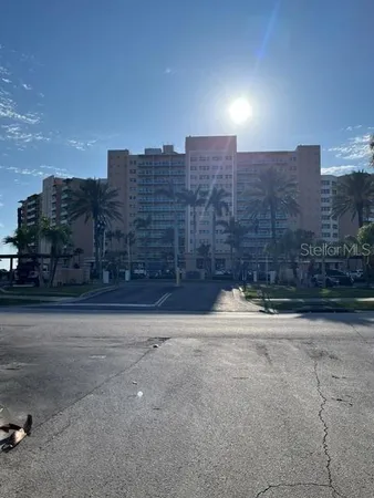 a view of a building with a road