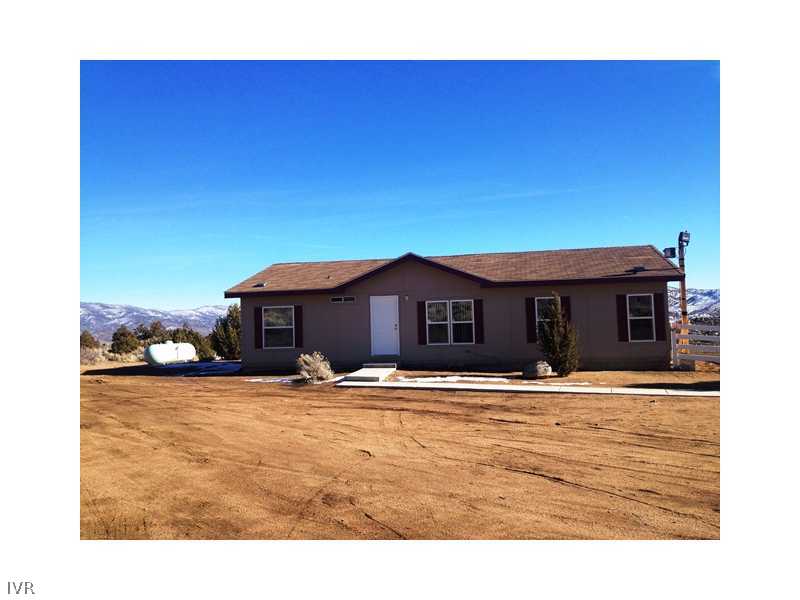 4700 Axe Handle Canyon Road Reno, NV 89510 - Photo 3 of 25 a house view with a outdoor space