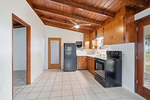 a bathroom with a shower a toilet and a shower