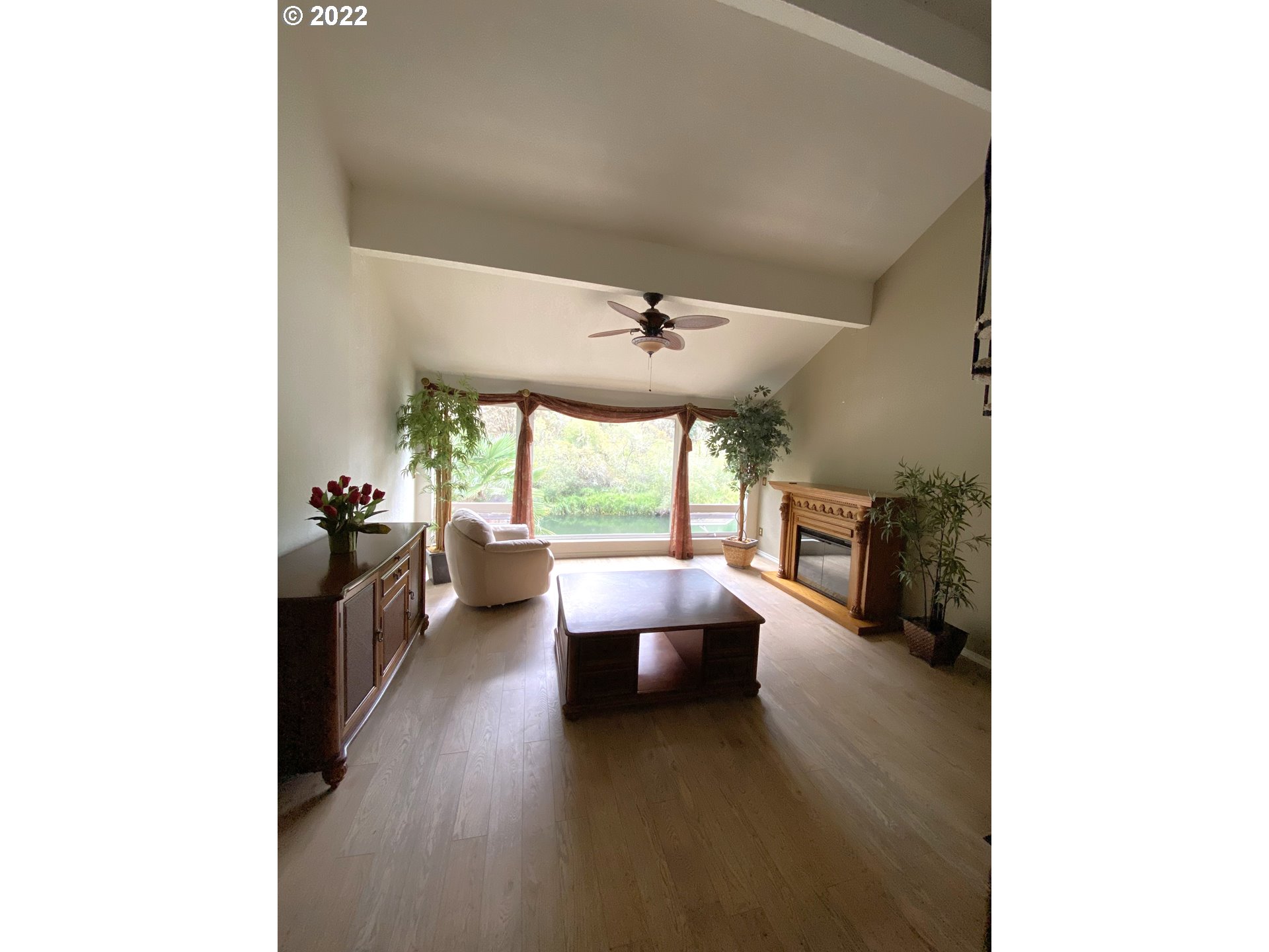 43605 Highway 38, Unit 24 Reedsport, OR 97467 - Photo 11 of 27 a living room with furniture and a large window
