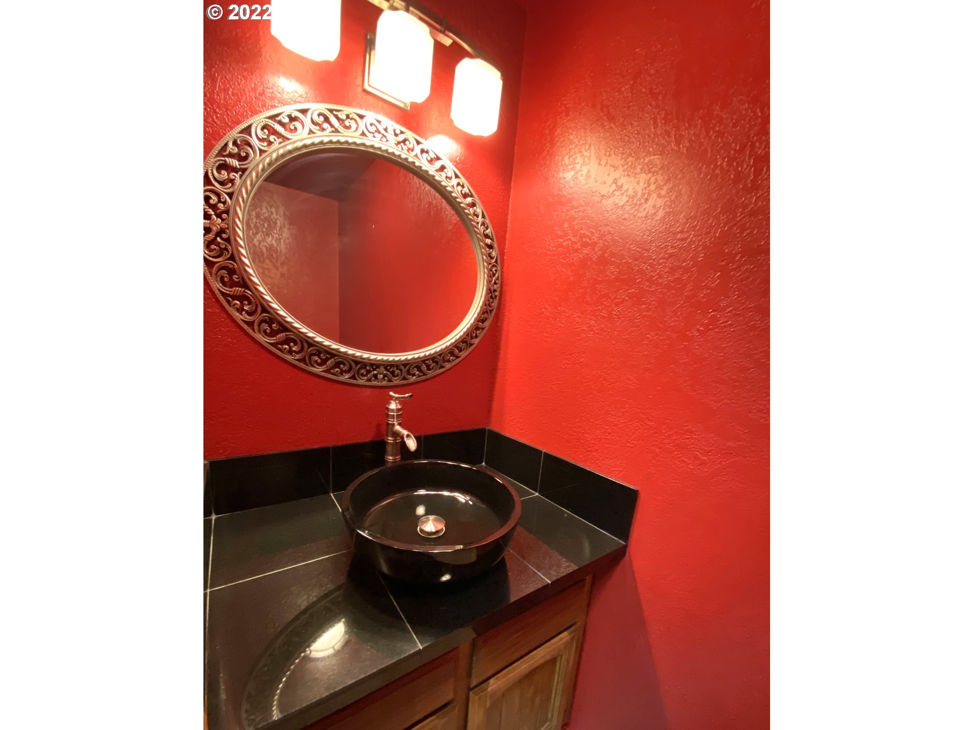 43605 Highway 38, Unit 24 Reedsport, OR 97467 - Photo 15 of 27 a bathroom with a sink and a mirror