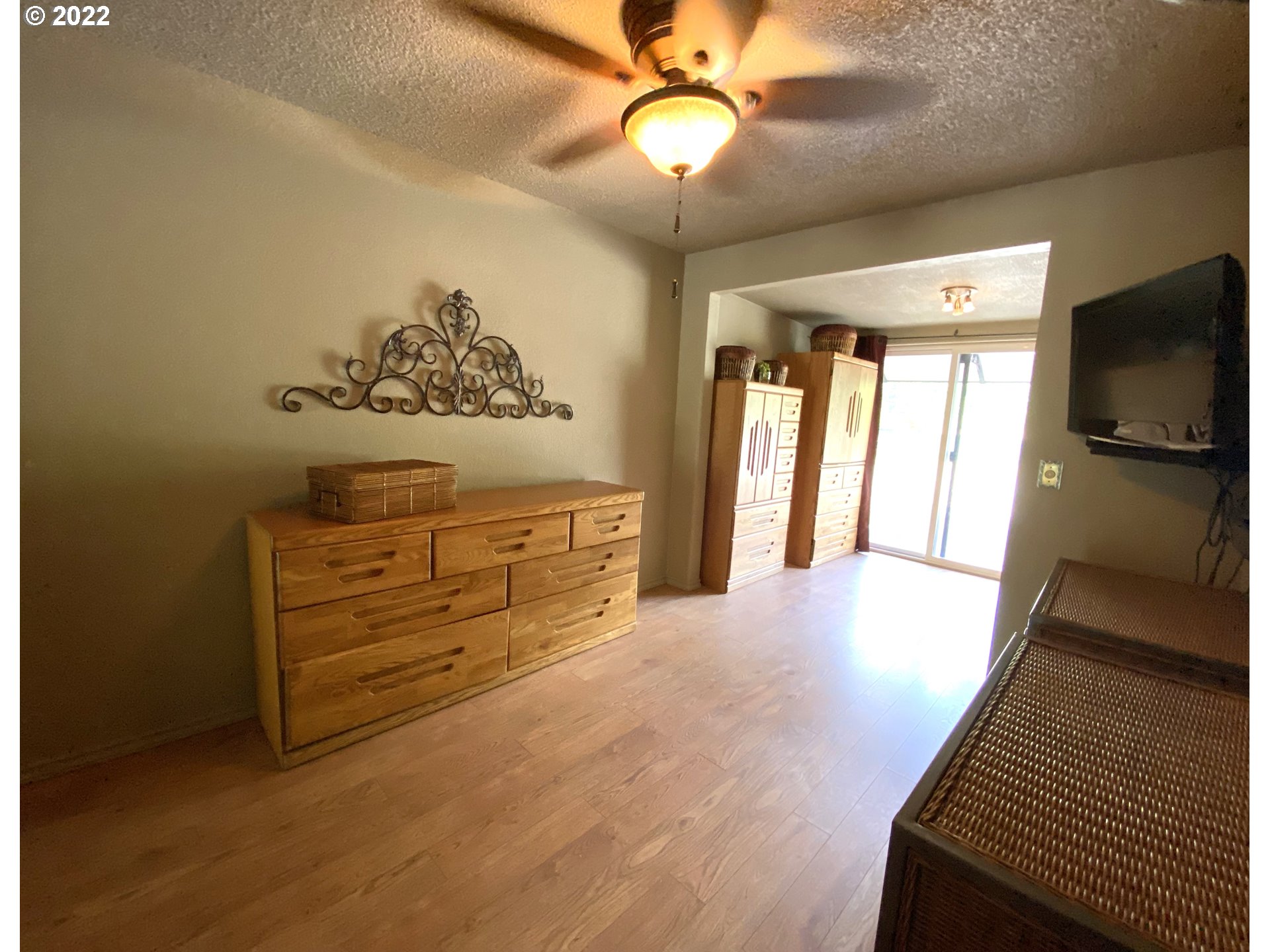 43605 Highway 38, Unit 24 Reedsport, OR 97467 - Photo 25 of 27 a view of a hallway with furniture and chandelier