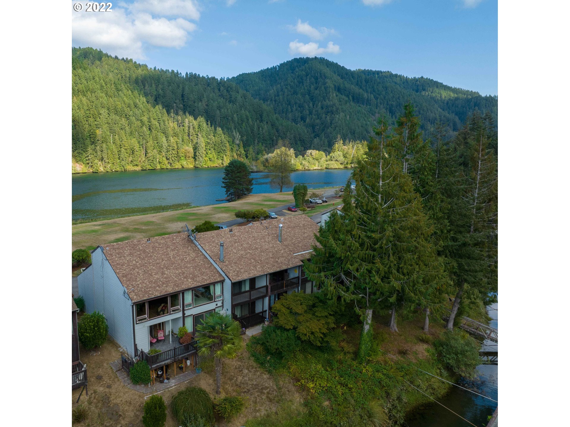 43605 Highway 38, Unit 24 Reedsport, OR 97467 - Photo 4 of 27 a view of a back yard
