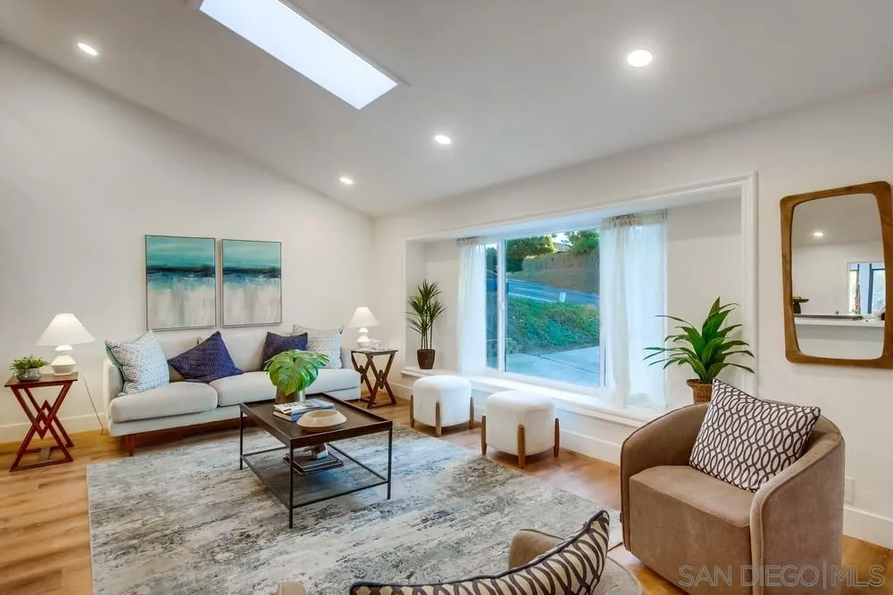 4793 54th Street San Diego, CA 92115 - Photo 14 of 74 a living room with furniture and a large window