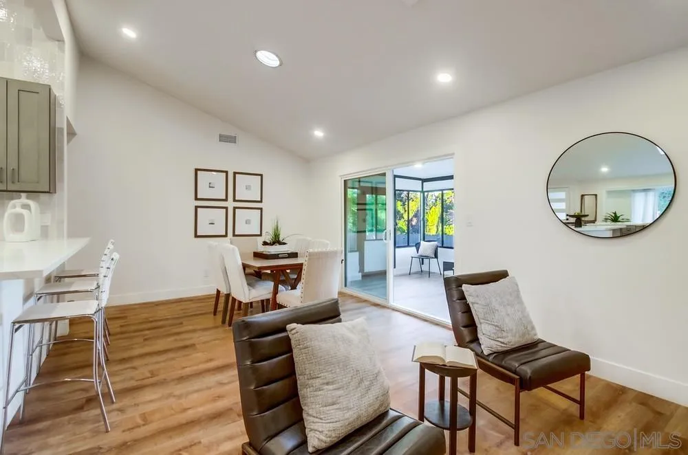 4793 54th Street San Diego, CA 92115 - Photo 18 of 74 a living room with furniture and a window
