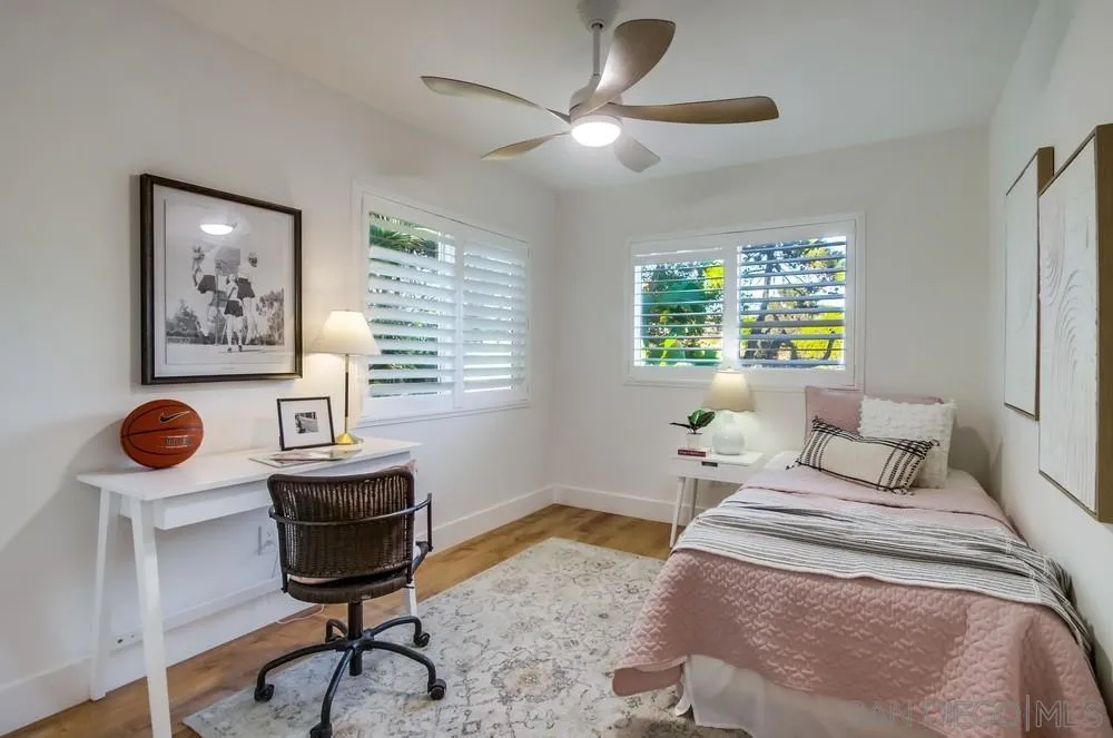 4793 54th Street San Diego, CA 92115 - Photo 43 of 74 a bedroom with a bed and a window